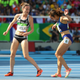 2016 Rio Olympics - Athletics - Preliminary - Women's 5000m Round 1 - Olympic Stadium - Rio de Janeiro, Brazil - 16/08/2016. Nikki Hamblin (NZL) of New Zealand stops running during the race to help fellow competitor Abbey D'Agostino (USA) of USA after D'Agostino suffered a cramp. REUTERS/Kai Pfaffenbach FOR EDITORIAL USE ONLY. NOT FOR SALE FOR MARKETING OR ADVERTISING CAMPAIGNS. - RTX2L6XP